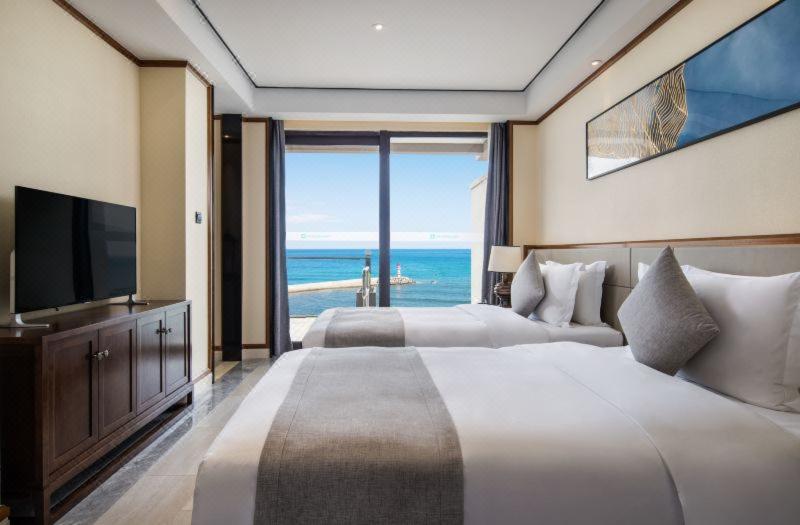 Hotel Wyndham Shenzhou Peninsula à Wanning Extérieur photo