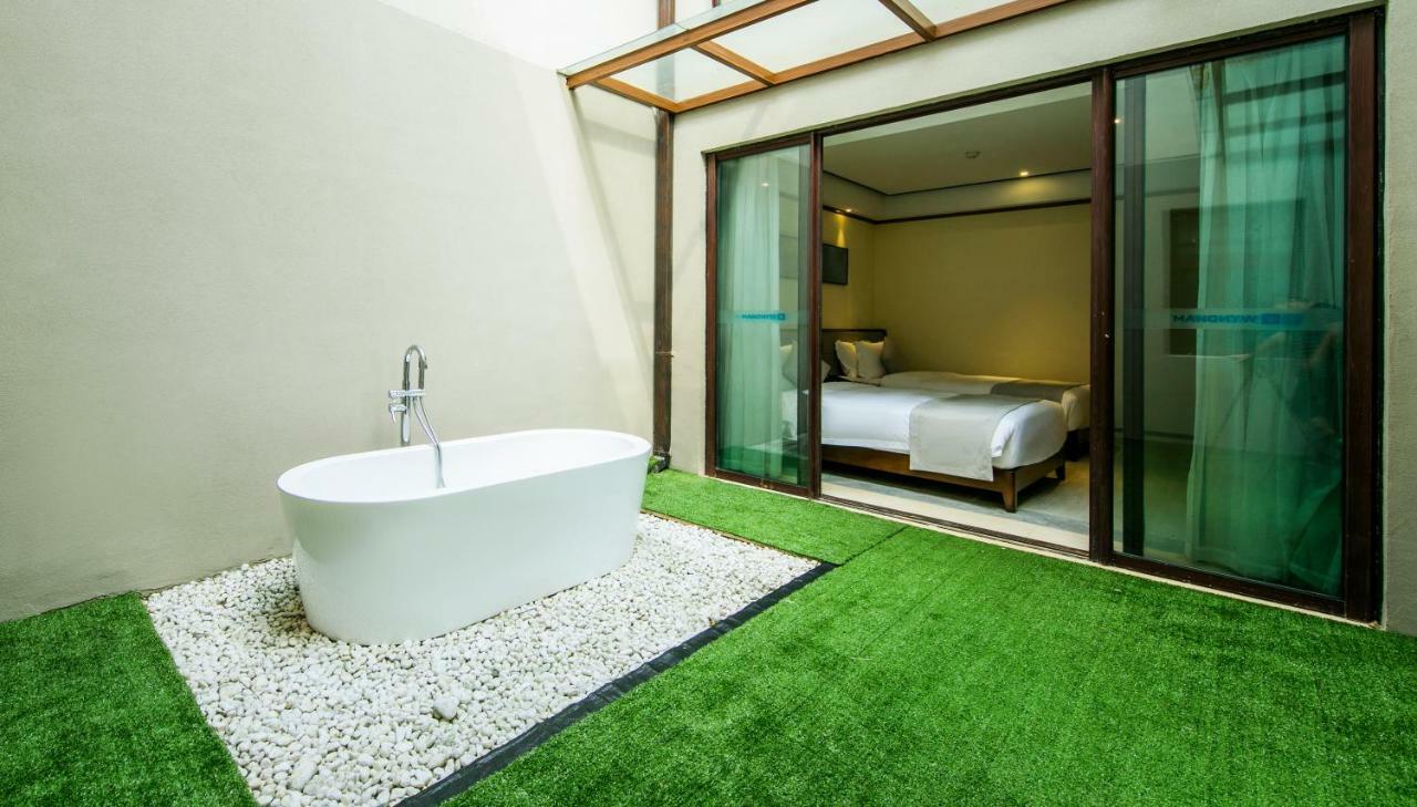 Hotel Wyndham Shenzhou Peninsula à Wanning Extérieur photo